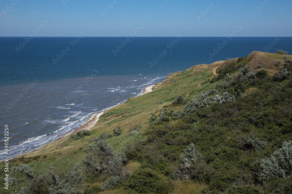 Beach on the coast of the sea of Azov. Kuchuguri Beach on the coast of the sea of Azov. Kuchuguri