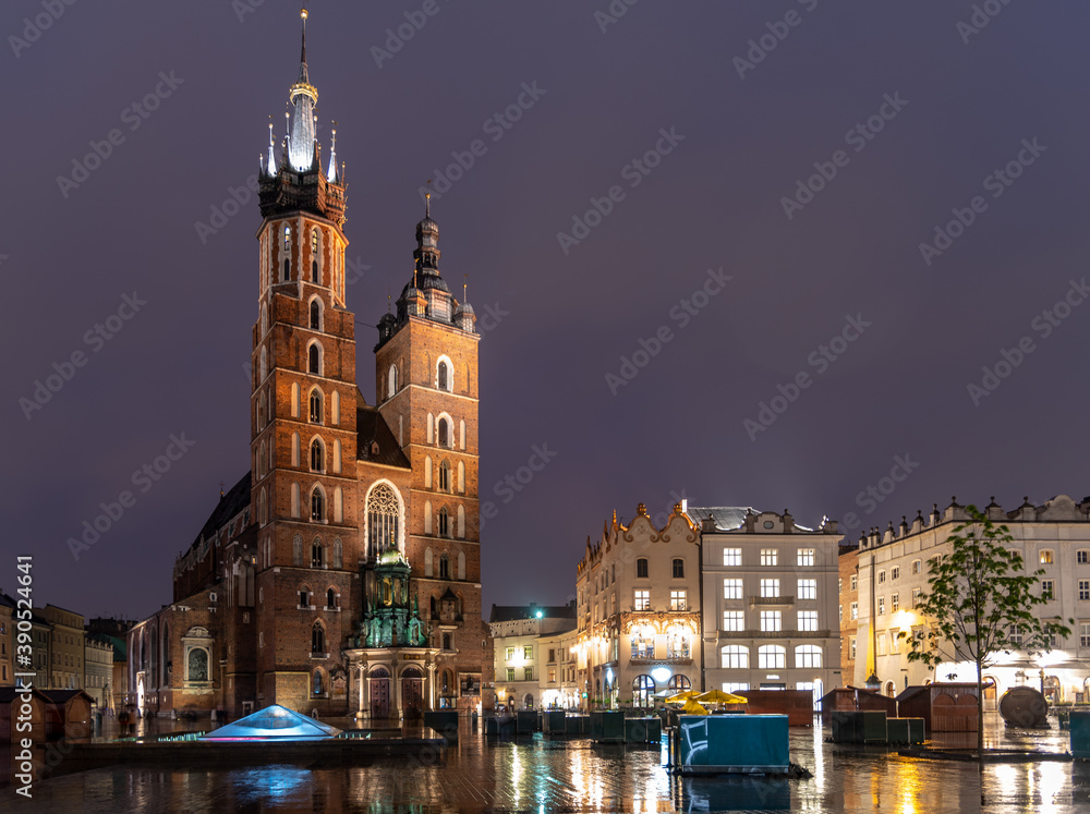 St Mary's Basilica at night in the Main Market Square Krakow