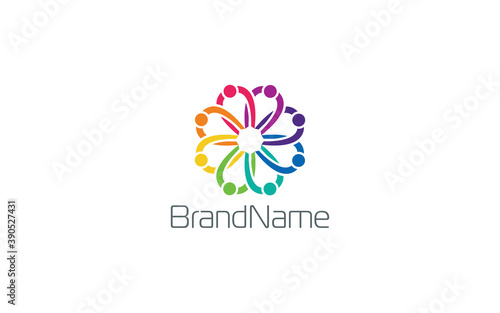 Teamwork logo is formed from a group of people collaborating in colorful