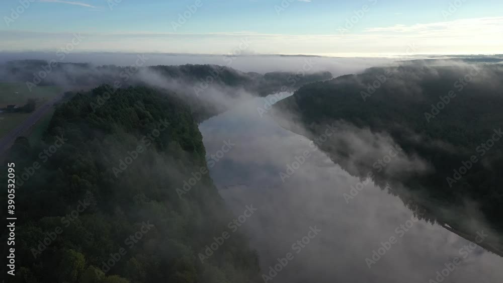 Fog over the river. Lithuania landscape. Drone aerial view Fog over the river. Lithuania landscape. Drone aerial view