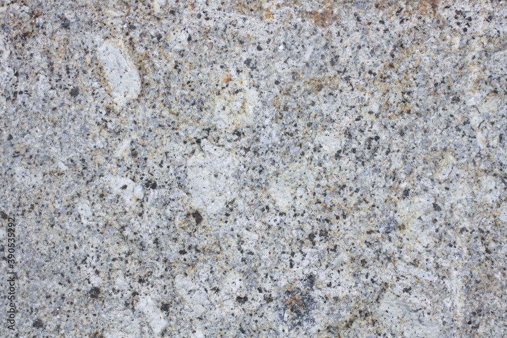 Porphyritic granite surface. Intrusive igneous rock. Porphyritic granite surface. Intrusive igneous rock.