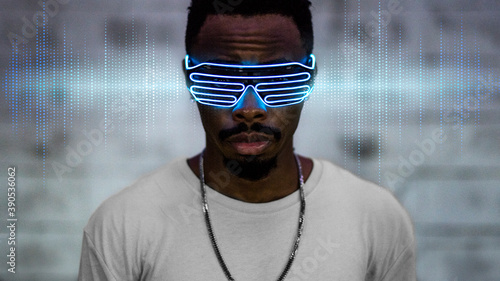 Canvas Print Black man wearing a blue light eyeglasses