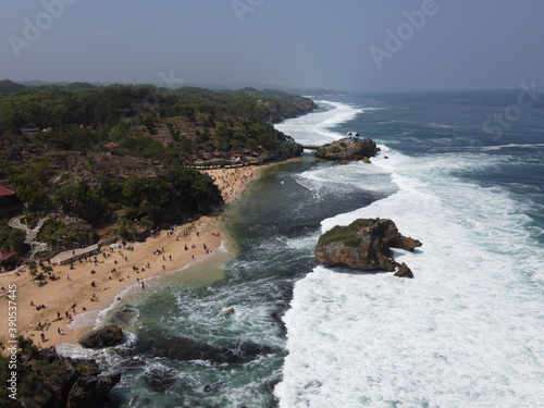 the panoramic beauty of the tourist attraction of Baron Kukup Sepanjang Beach, Gunung Kidul Regency, Yogyakarta Special Region photo