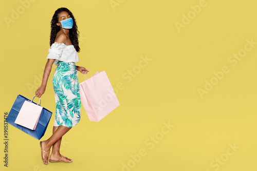 Covid 19, woman shopping in face mask is the new normal