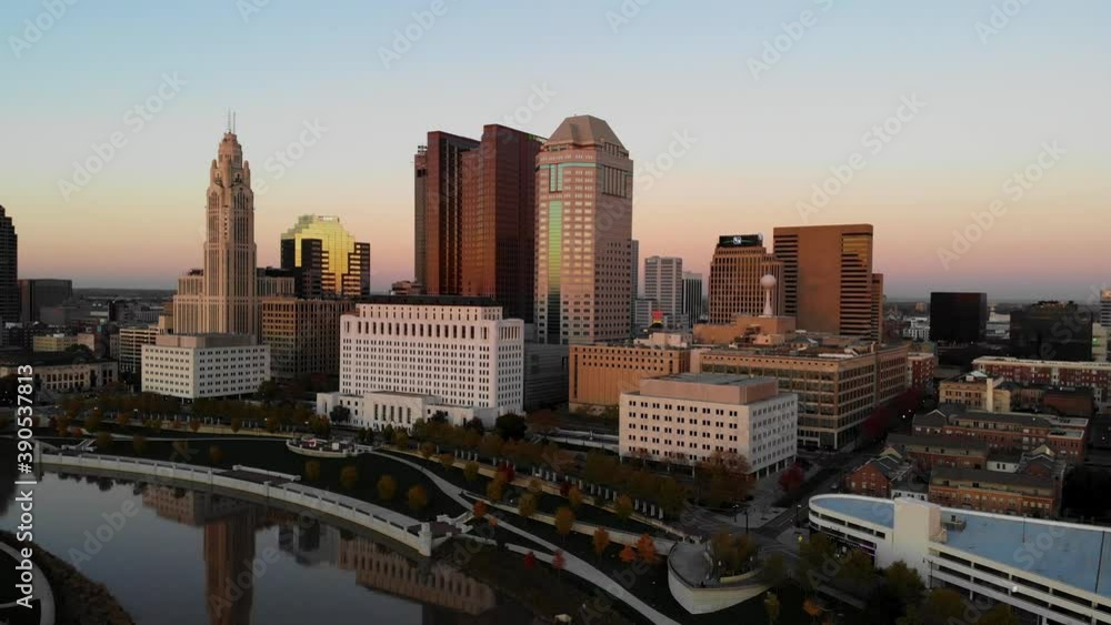 Columbus Ohio Skyline at dusk with the Scioto River in the foreground Columbus Ohio Skyline at dusk with the Scioto River in the foreground