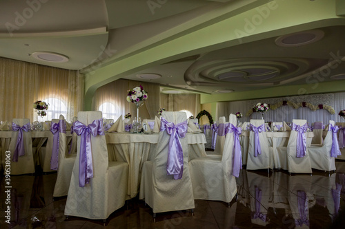 Fragment of the interior of the restaurant, decorated for the wedding