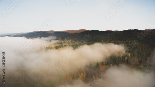 Obraz na płótnie Landscape with fog and hills on an epic autumn morning w salonie