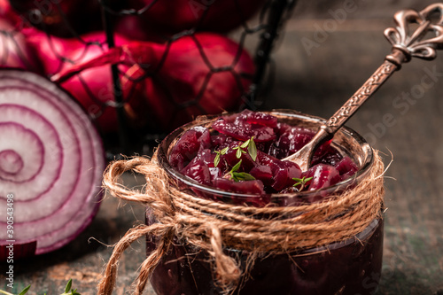 Red onion marmalade jam, confiture, chutney with wine and thyme, Delicious sauce. Gourmet, banner, catering menu recipe top view photo