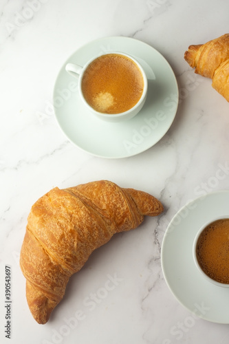 Fototapeta Naklejka Na Ścianę i Meble -  breakfast black coffee and croissants.