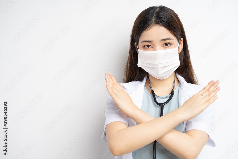 portrait of female doctor instructing to wear a mask properly portrait of female doctor instructing to wear a mask properly