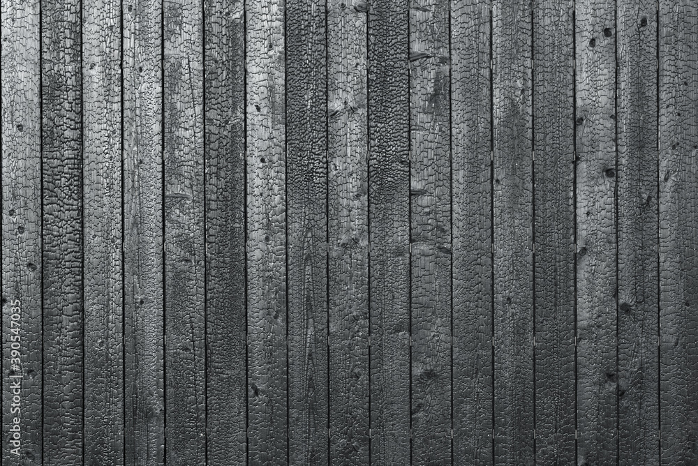 Fototapeta premium Burnt wooden board texture. Sho-Sugi-Ban Yakisugi is a traditional Japanese method of wood preservation