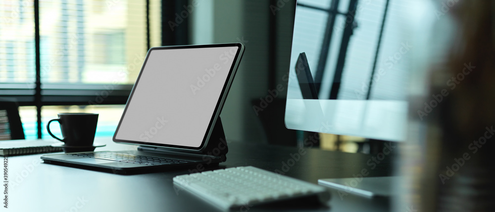 Office desk with digital tablet, computer, keyboard and supplies, clipping path Office desk with digital tablet, computer, keyboard and supplies, clipping path