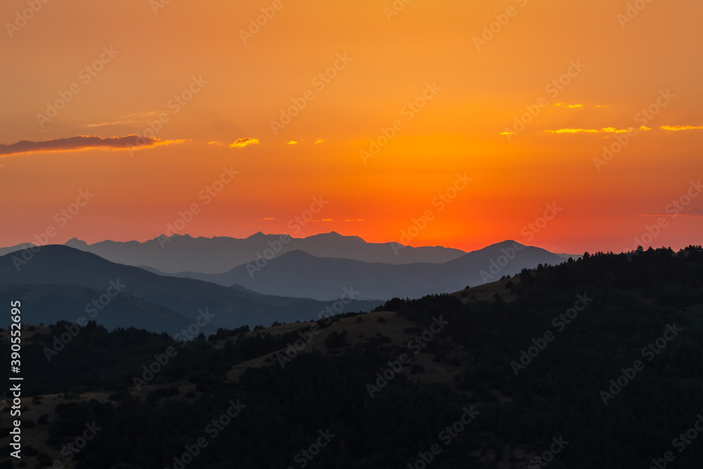 Obraz premium sunset over mountains shade