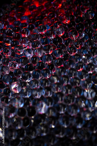 Background from small transparent hydrogel balls illuminated with blue and red light