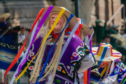 Traditional dance of the old men in the main square of Morelia, Mexico photo