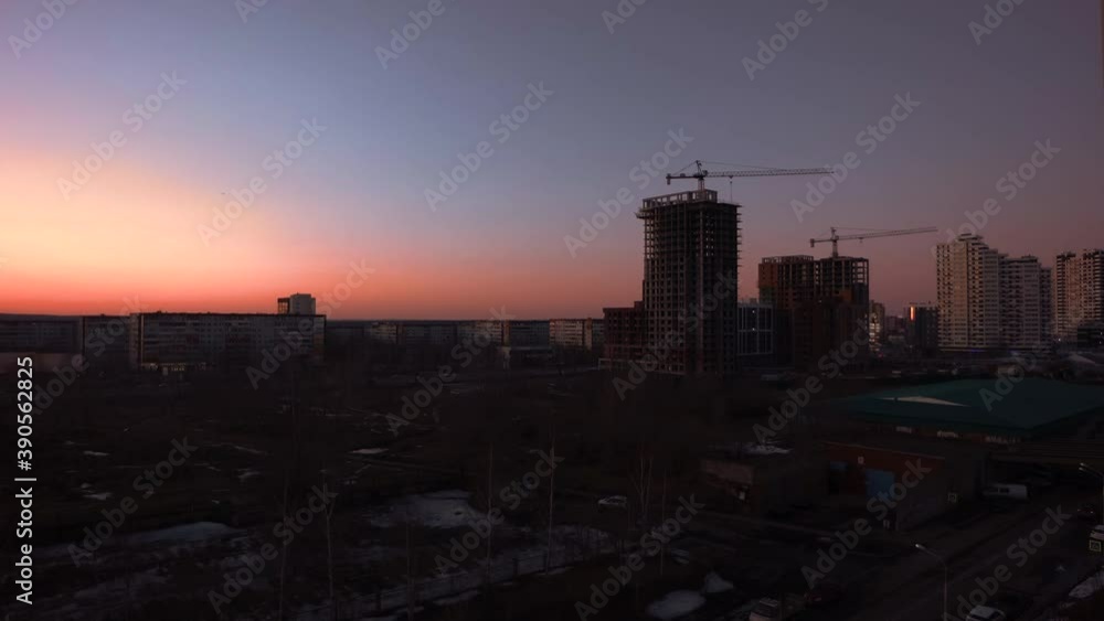 Cityscape against the backdrop of the setting sun Cityscape against the backdrop of the setting sun