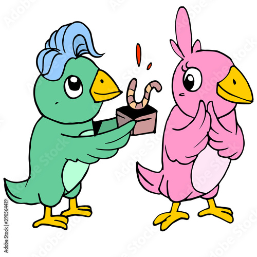 a male bird is proposing a female bird