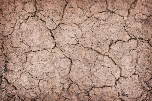 Top view cracked red soil ground Earth for texture natural abstract background