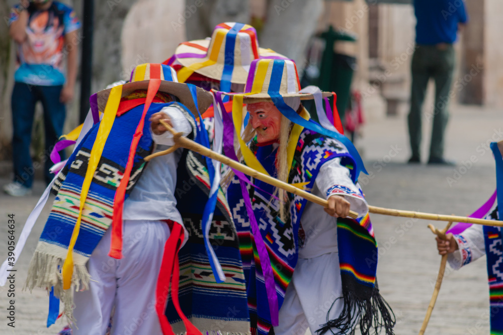 Traditional dance of the old men in the main square of Morelia, Mexico