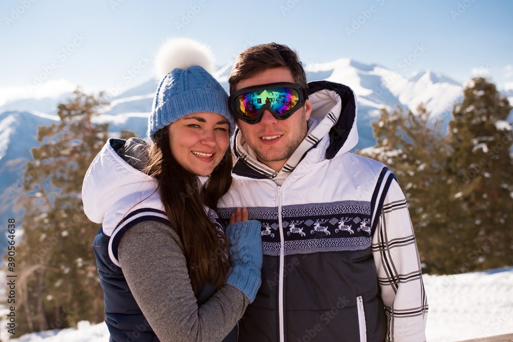 Young people take a rest after skiing in the mountains, winter time. Young people take a rest after skiing in the mountains, winter time.