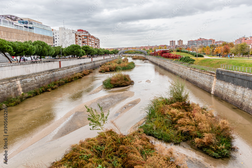 Manzanares river as it passes through legazpi, in the arganzuela neighborhood in the city of madrid
