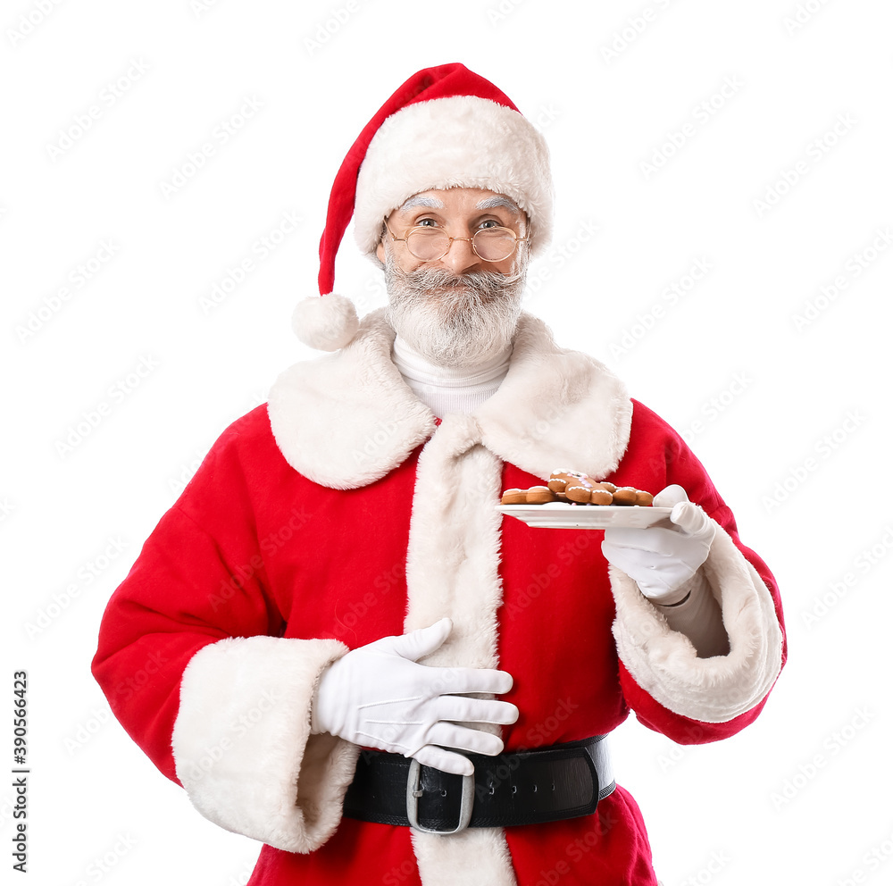 Santa Claus with tasty gingerbread cookies on white background Santa Claus with tasty gingerbread cookies on white background