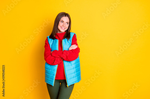 Photo of charming attractive girl cross hands enjoy winter weekend rest relax look copyspace wear season outfit trousers isolated over shine color background