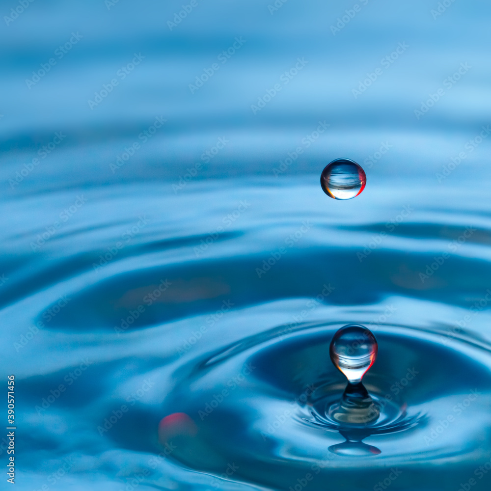 Blue Water drop splash with red tones Blue Water drop splash with red tones