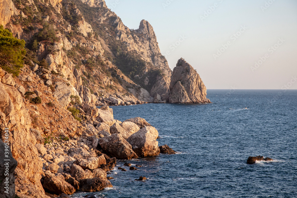 Naklejka premium rocky sea shore, seascape and blue sea
