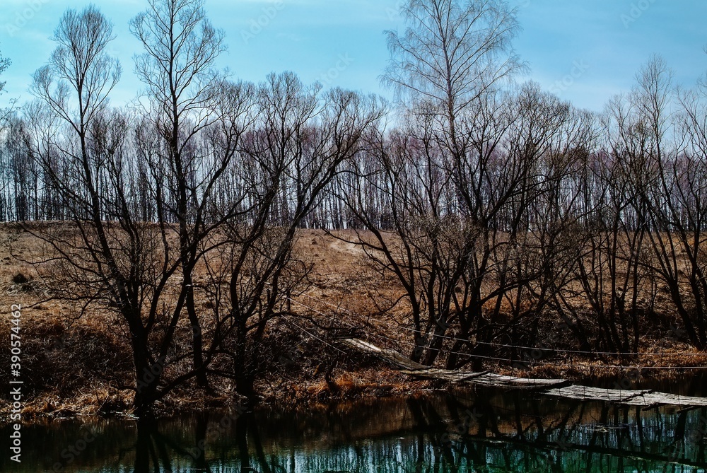 Obraz premium old broken bridge over the river