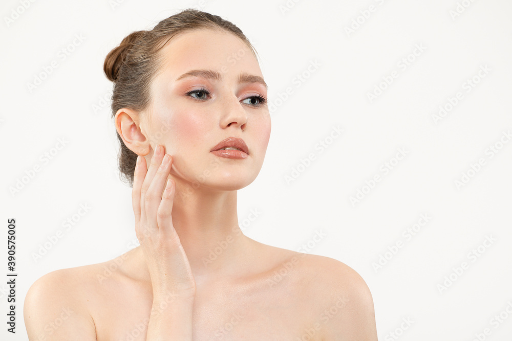 Portrait of a beautiful young woman with clean skin and makeup on a white background Portrait of a beautiful young woman with clean skin and makeup on a white background