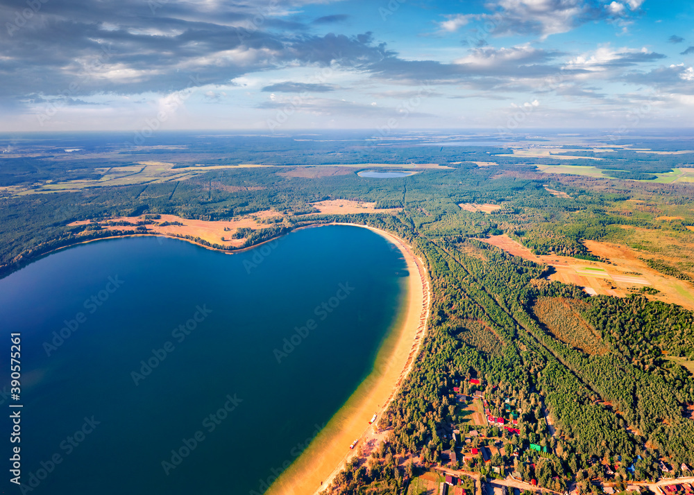 Aerial view in the shape of heatr of Pisochne Lake. Incredible morning scene of Shatsky National Park, Volyn region, Ukraine, Europe. Beauty of nature concept background.