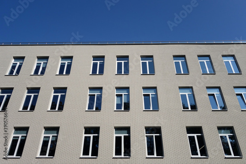Modern industrial and office building from outside.