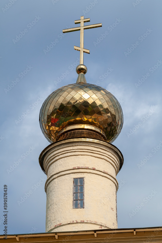 Golden cupola with cross of Tikhvin Cathedral