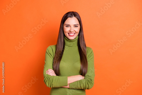 Photo of young beautiful woman happy positive smile folded hands wear casual outfit isolated over orange color background © deagreez