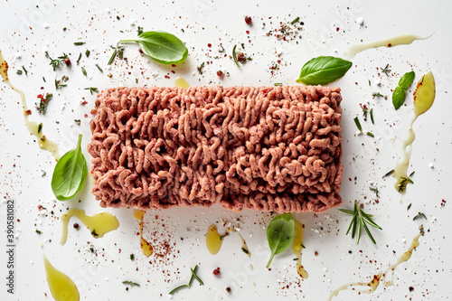 Block of raw vegan mince meat with herbs