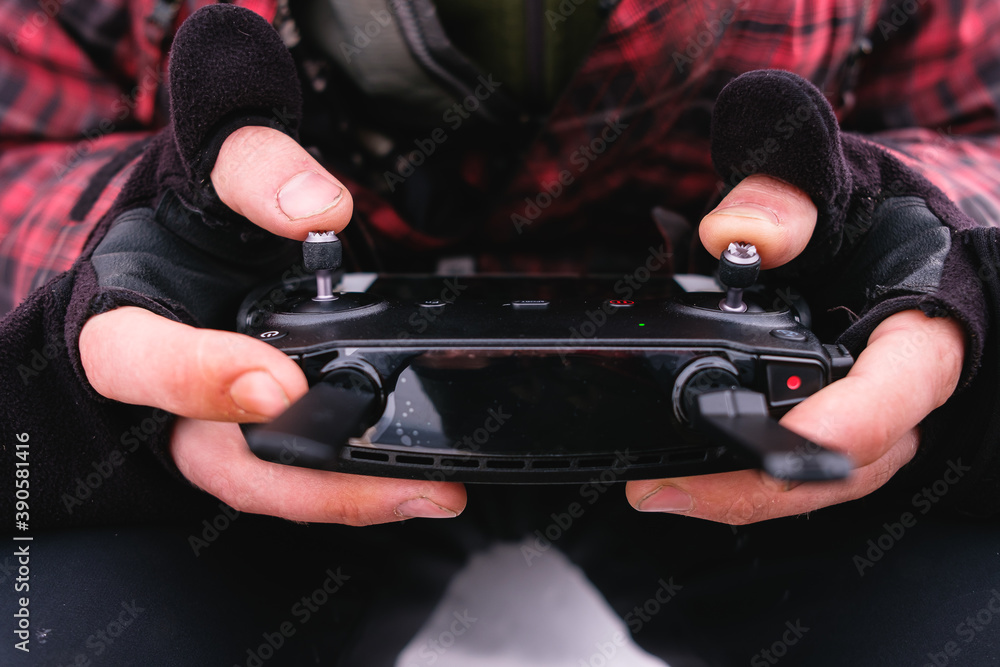 Drone control panel in male hands Drone control panel in male hands
