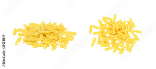 Top view of yellow uncooked fusilli pasta set isolated on white background.