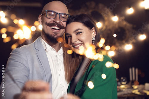 Romantic couple enjoying at the party cocktail together. Happy and smiling face