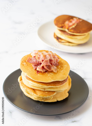 A fresh made pancake with crispy bacon and syrup, traditionale Dutch recipe