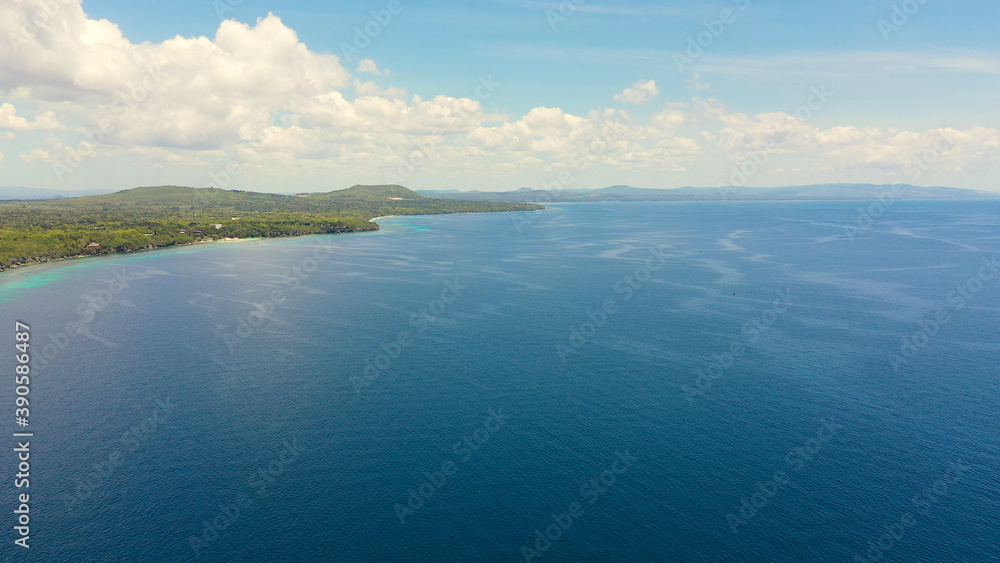 Aerial drone of coast, turquoise sea and sand beach. Panglao island, Bohol, Philippines.