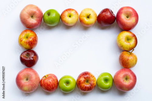 Frame made of apples on white background. Top view