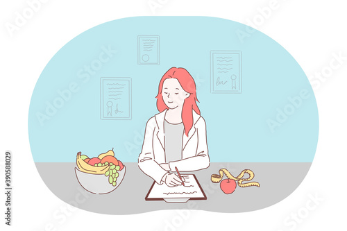 Healthy food, dieting, professional nutritionist concept. Smiling red haired woman doctor nutritionist in white uniform sitting writing prescription of healthy fresh diet for weight loss for client