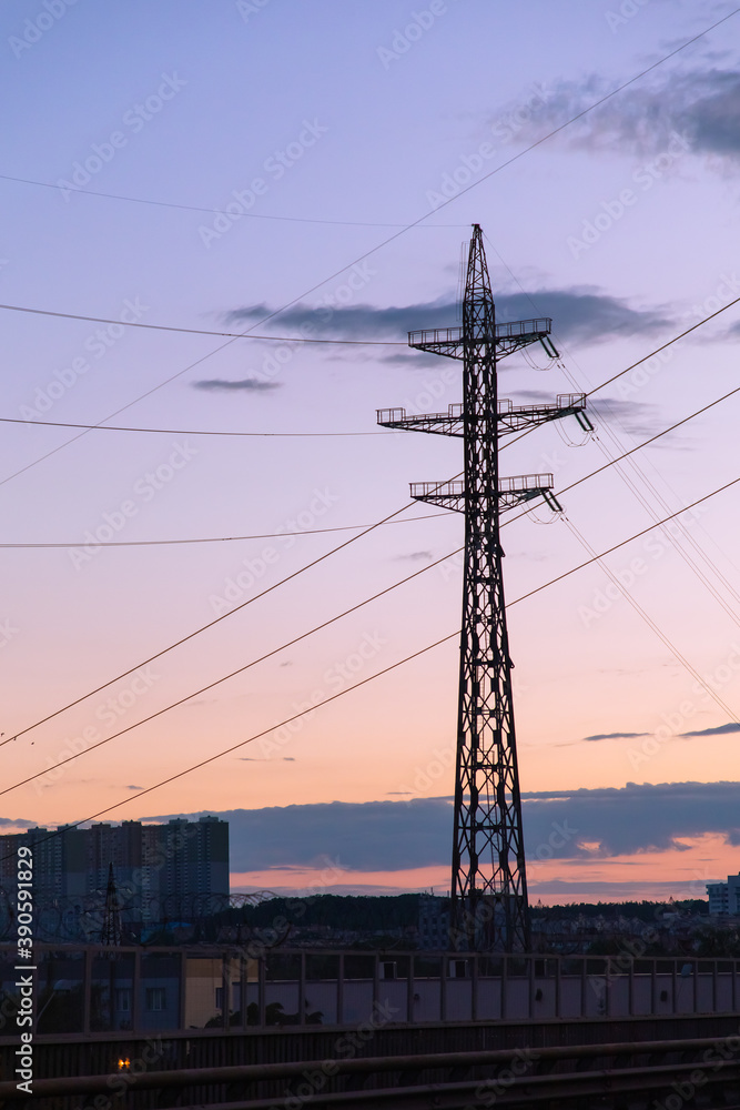 Power tower and lines at sunset