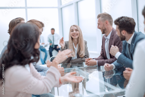 young businesswoman explaining new tasks at a working meeting.