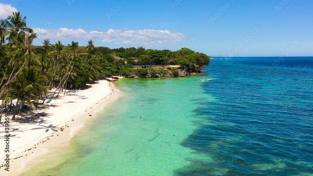 Tropical landscape: beautiful beach and tropical sea. Alona beach, Panglao island, Bohol, Philippines. Summer and travel vacation concept.