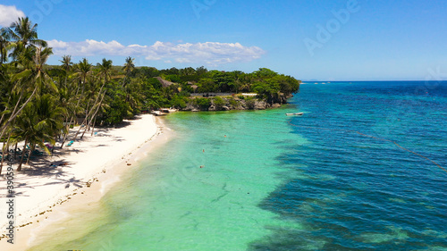 Fototapeta Naklejka Na Ścianę i Meble -  Tropical landscape: beautiful beach and tropical sea. Alona beach, Panglao island, Bohol, Philippines. Summer and travel vacation concept.