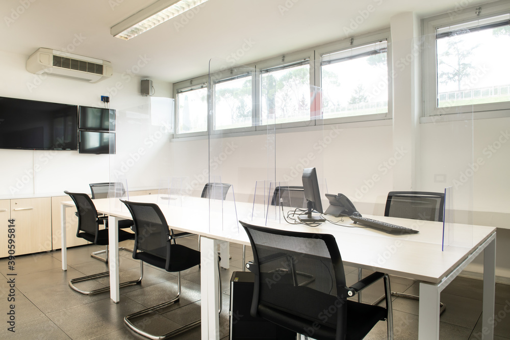 Business office room funriture white with desktop and television monitor no people Business office room funriture white with desktop and television monitor no people
