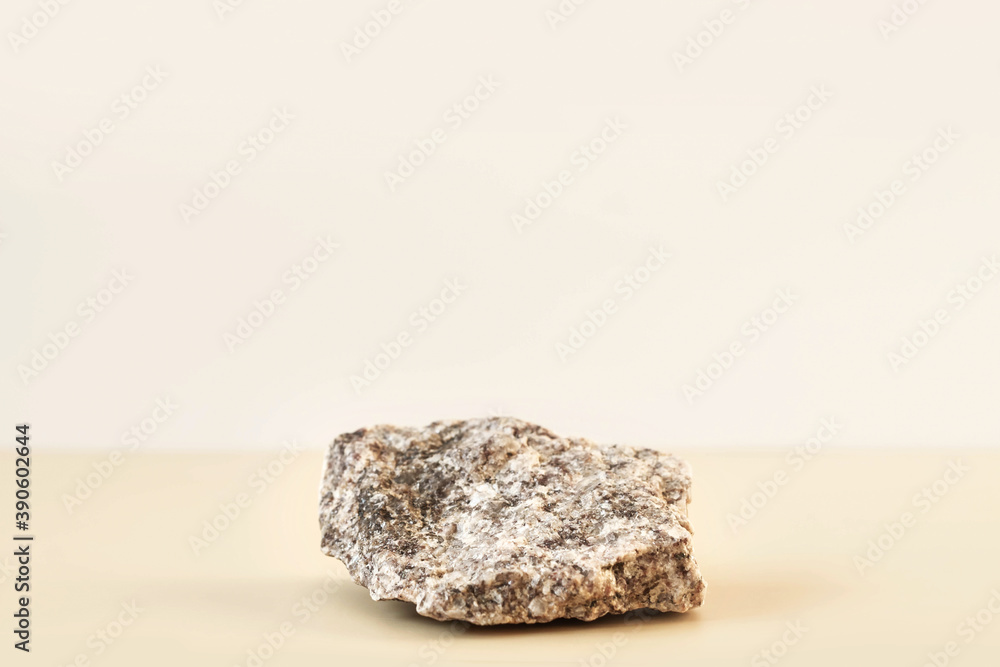 Natural stone stand for presentation and exhibitions on pastel background. Abstract podium for organic cosmetic products. Minimal style. Natural stone stand for presentation and exhibitions on pastel background. Abstract podium for organic cosmetic products. Minimal style.