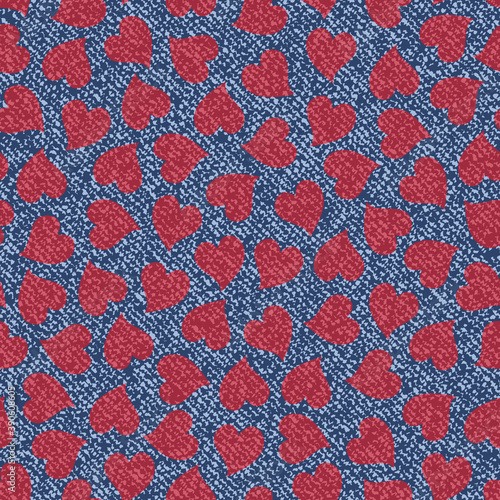 Jeans background with hearts. Vector Denim seamless pattern. Blue jeans cloth. Valentine's Day wallpaper.